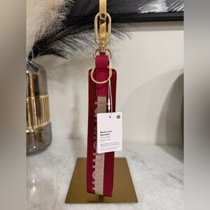 lululemon athletica Burgundy Keychain with Gold Accents